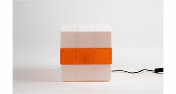 Image may contain: Orange, Rubik's Cube, Puzzle, Mechanical puzzle.