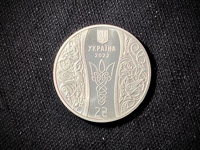 Bildet kan inneholde: valuta, mynt, penger, metall, sølv.